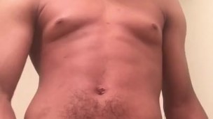 Masturbating