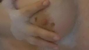 Hot girl with pink lips in bath