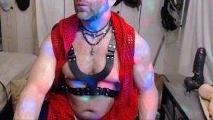 muscle man playing with tight corset