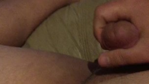 Fat guy masturbating and cumming all over himself