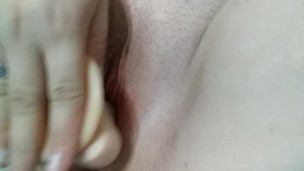 Pushing my small vibrator inside me with my 7in dildo
