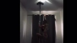 Sexy tattooed pole dancing teen shaking her ass in barely anything