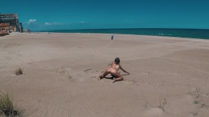 Awesome nudist girl have fun on a public beach in Valencia. Naked Outdoors