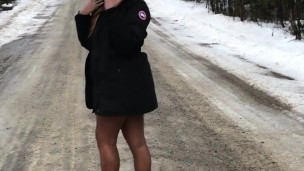 Flashing & peeing naked in the snow on the side of the road.