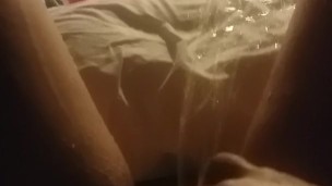 Pissing in bed making a big puddle