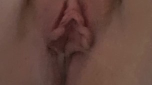 Close up pissing in bathroom