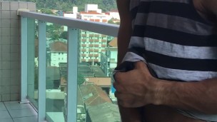 The public jack off on the balcony of the building.