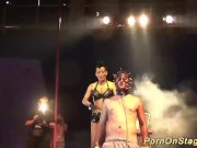 tattoed babe in a public bdasm sex show