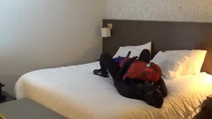 mindless moaning black sex drone playing with his spiderman dummy