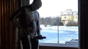 Dawn of the dead morphsuit in window cums into black rubber cock extender