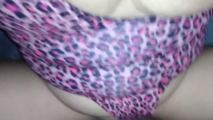 Girl in one piece gets a load on her big tits
