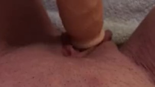 Teasing my clit with my dildo