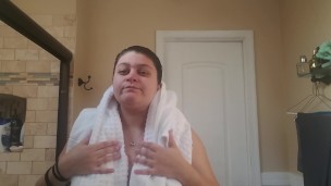 Touching my boobs after a shower.