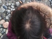 Asian teen gives blowjob and flashes on public beach 11/16