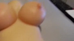 Playing with doll tits