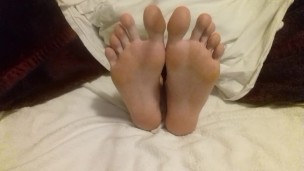 Bare feet and soles - red toenails and sexy toes spread