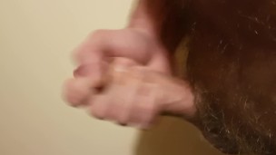 Hairy bear jerks off, cums loads