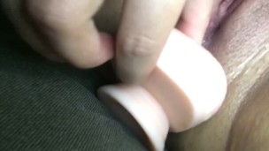Toy gliding out of tight ass.