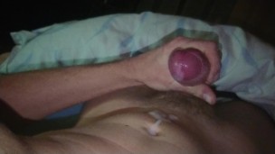 Fit guy shooting thick load of cum on himself