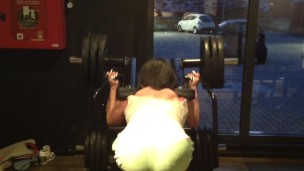muscle girl pumping booty . Monster hack squat.