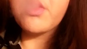 SMOKING FETISH: Capri smokes again.