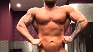 Tattooed Muscle Stud Flexes Naked In Gym Locker Room