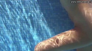 Famous Mary Kalisy is posing swimming naked for XXXWATER