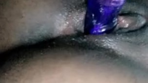 Ebony lesbian playing in that fat pussy with toy