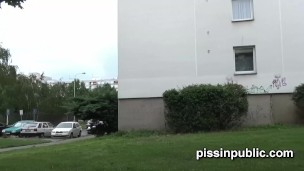 Desperate girls are pissing in front of their neighbours house