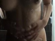 Petite Latina has soapy fun in shower ;)