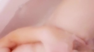 Deep fingering in the bathtub