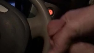 Stroking soft white cock in electric car POV