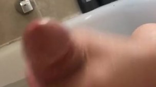 White Cock stroking in the bath tub with baby oil POV