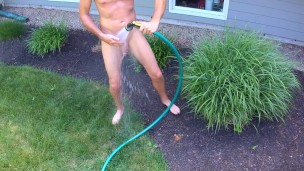 Outdoor garden shower drone filmed hose out