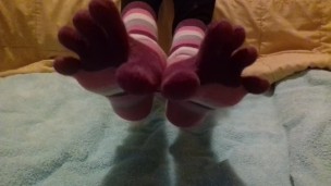 Spreading my toes and showing you my feet and soles in toe socks