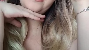 Smoking close up in bra
