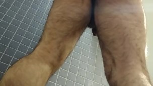 Self fisting in public showers: hot man gets naughty when nobody's around