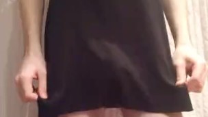 boy CD Wearing a Little Black short Do / Skirt