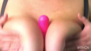 DILDO BETWEEN HUGE NATURAL TITS