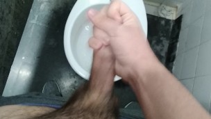 MASTURBATING IN THE UNIVERSITY PUBLIC BATHROOM