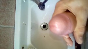 Strocking morning wood boner in the bathroom