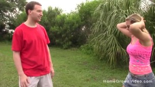 Big tit blonde amateur jerks off a cock outdoors