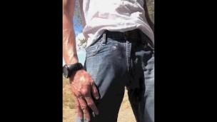 Wetting jeans and squirting cum next to a public highway