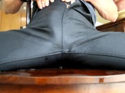 Black pants glisten with piss and I massage my bulge until I orgasm