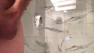 Soft cock and balls stroking in hotel bathroom