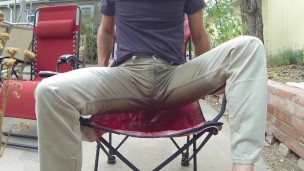 Pissing khaki pants outdoors and eating cum