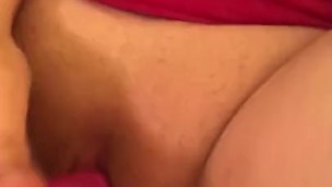 Lesbian masturbating with vibrator