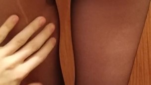 schoolgirl in a skirt and pantyhose showed herself on camera