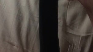 Solo playing with 12" double ended dildo