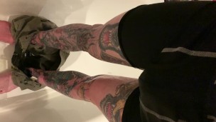Tattooed guy desperate wetting taking off shorts and boxers